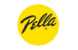 The image displays the Pella logo, with "Pella" in elegant black cursive set within a bright yellow circle—a symbol you might spot on homes after a quality roof repair in New Castle County, DE.